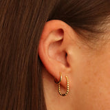 Gold Dotted U Huggie Hoops